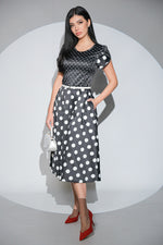 Rochia Dottie Noir cu buline, buzunare si curea