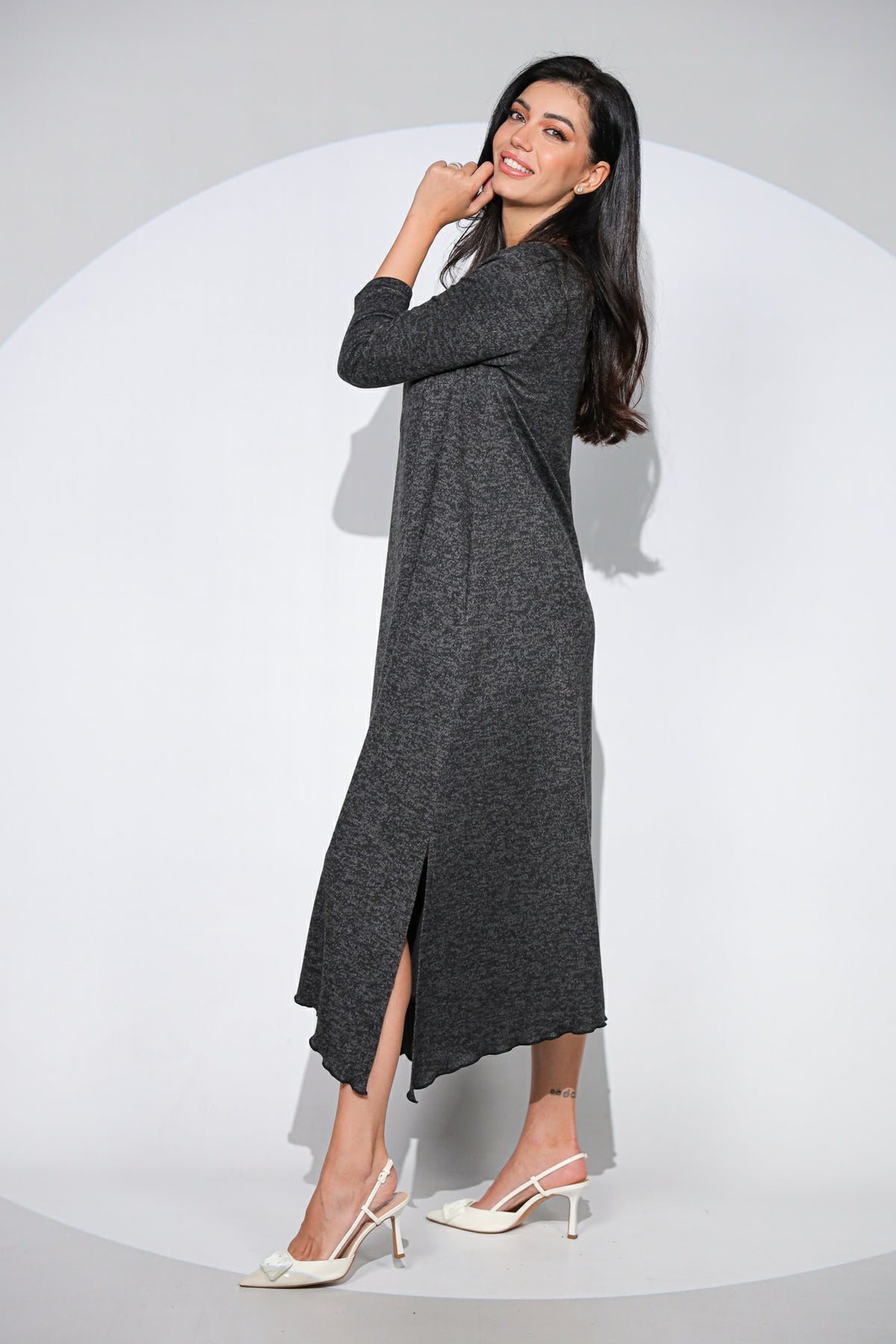 Rochia Venice neagra din jerseu cu lana, croi lejer si asimetric