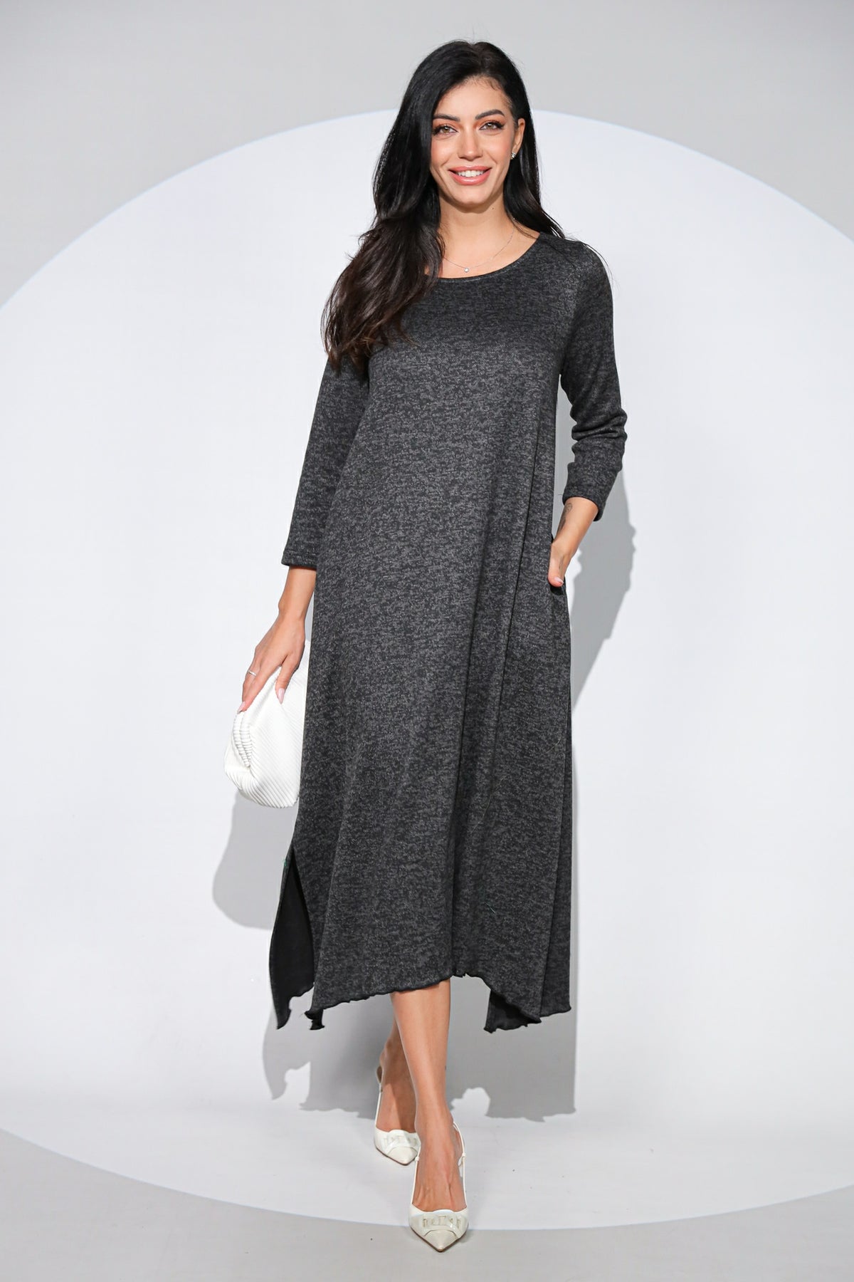 Rochia Venice neagra din jerseu cu lana, croi lejer si asimetric