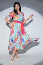 Rochia Lilibelle Fiesta din tesatura fluida, cu imprimeu multicolor, esarfe laterale si croiala midi