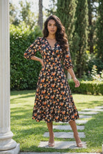 Rochia Livia neagra cu imprimeu floral, decolteu petrecut si volan | Monielle